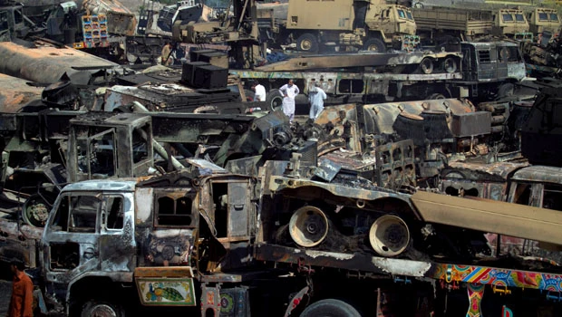 Gunmen kill 8, burn 50 NATO trucks in Pakistan