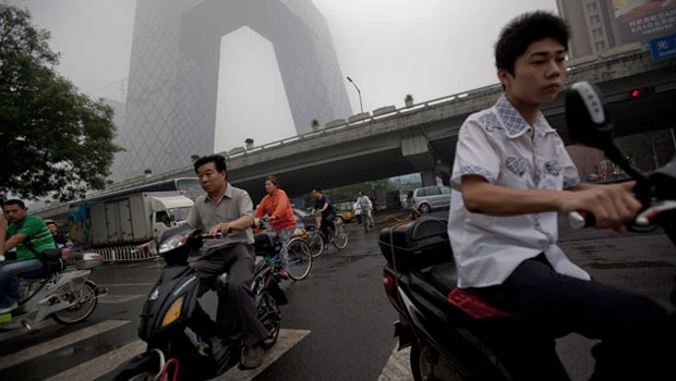 China's economic growth slows amid credit curbs