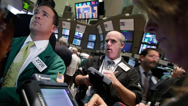 Global stocks, dollar rise as oil dips