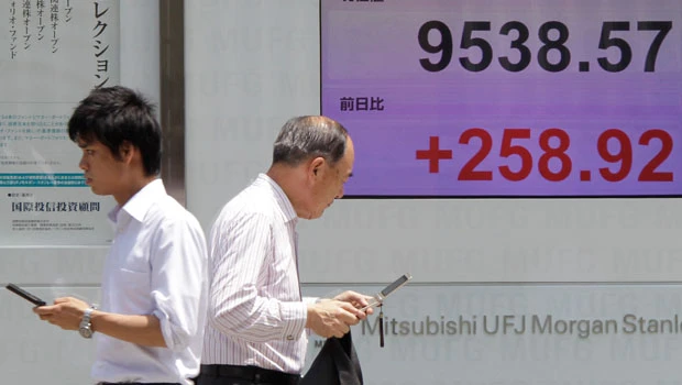 Stocks surge as IMF raises growth outlook
