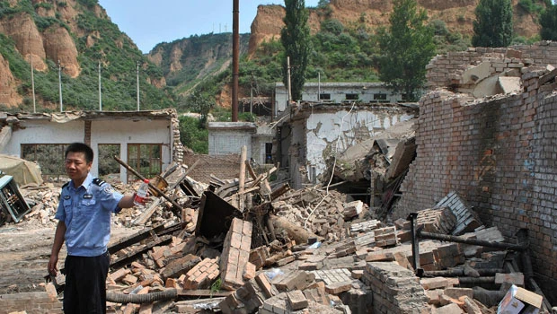 Two China mine industry accidents kill 17, trap 24