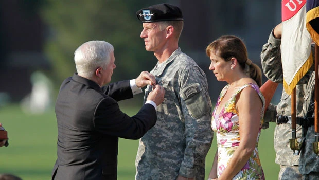 Gen. McChrystal ends service with regret and a quip
