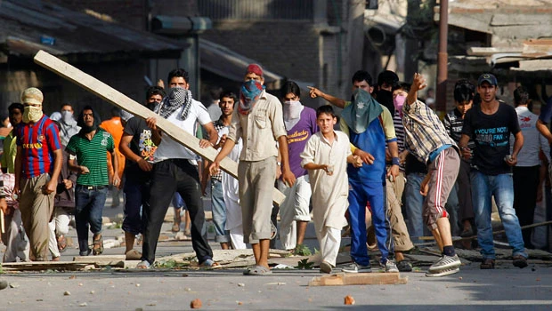 Two killed as cops fire on protesters in Kashmir