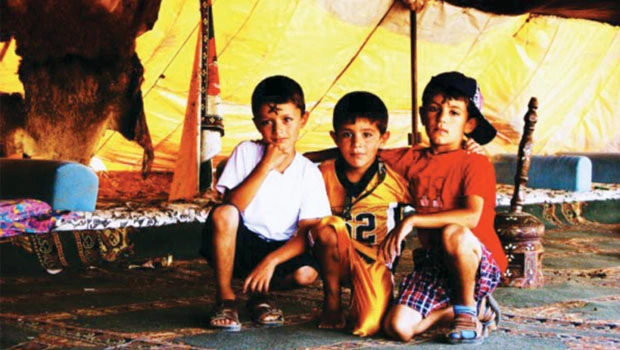 Photo exhibit shows Palestinians as they go about their daily lives under occupation