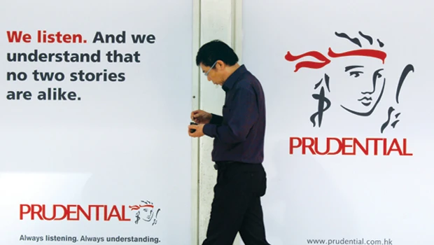 Prudential trims cost of botched AIA deal