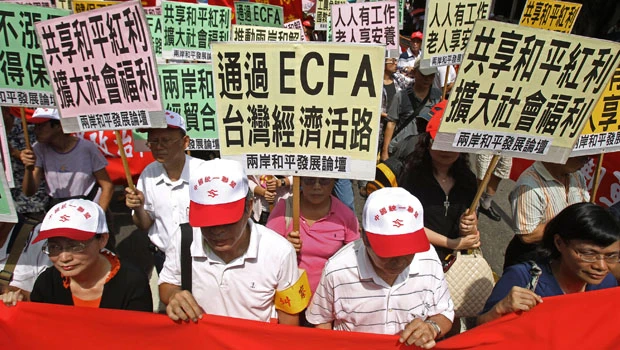 Taiwan's legislature approves China trade pact