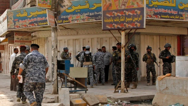 Gunmen storm Baghdad money exchange, kill 3