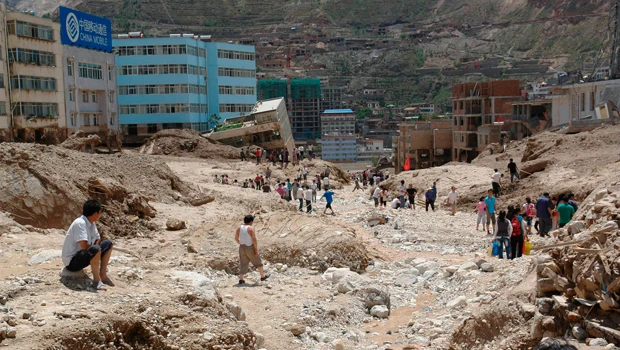 Mudslides ravage China town, 127 killed