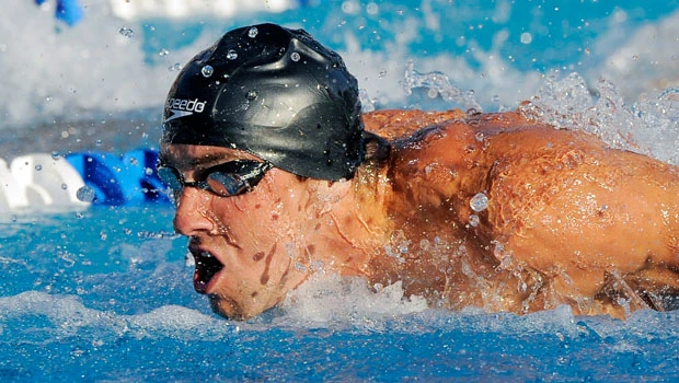 Phelps clocks fastest time for 100 fly