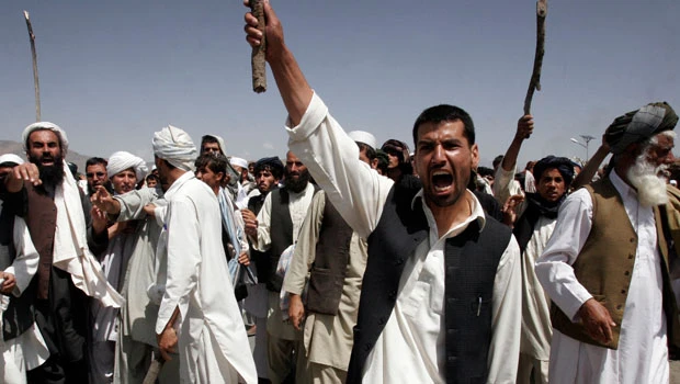 Karzai asks Obama for review of Afghanistan war