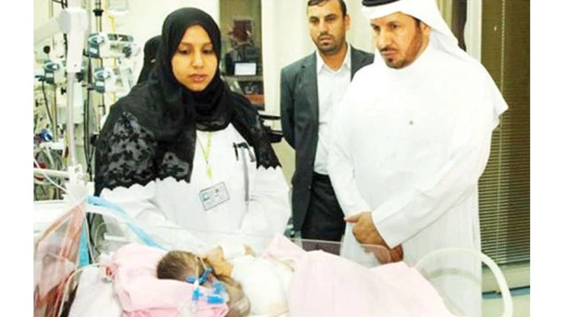 Surviving twin returns home