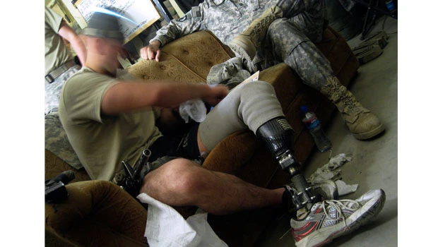 Wounded in Iraq, double-amputee returns to war