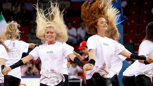 Cheerleaders cover up for Iran vs. United States in basketball game