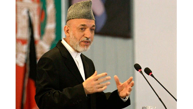 Karzai urges faster Afghan peace effort