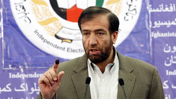Fraud, turnout weigh on "miracle" Afghan poll