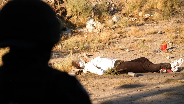 25 slain in Mexican city; 85 escape border prison