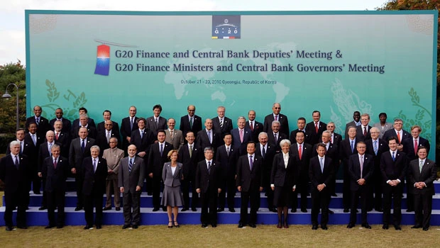 World stocks, dollar zigzag as G20 meets