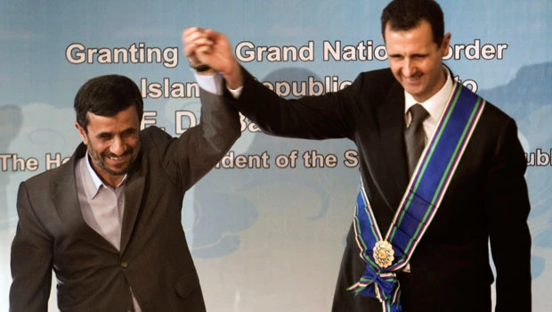 Assad says Mideast talks only to help Obama