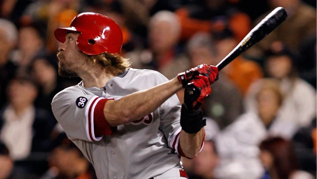Halladay bucks injury, keeps Phillies alive