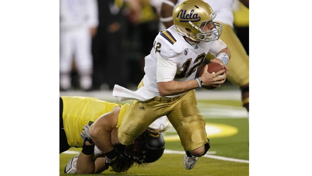 No. 1 Ducks romp over UCLA 60-13