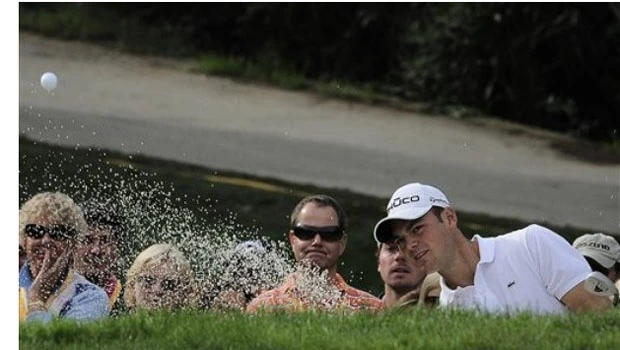 Kaymer stays cool but McDowell's hot putter earns him lead