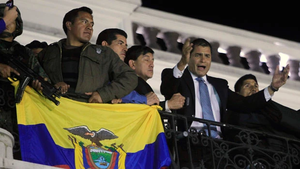 Ecuador calm after revolt; Correa alleges coup