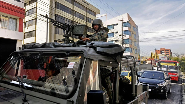 Ecuador’s Correa to purge rebel police, probe foes