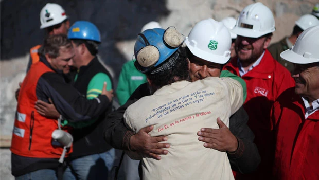 Hugs seen around the world as rescue goes global