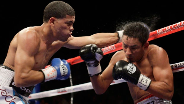 Lopez stops Marquez to retain WBO title