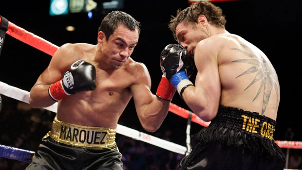 Marquez stops Katsidis, wants third Pacquiao fight