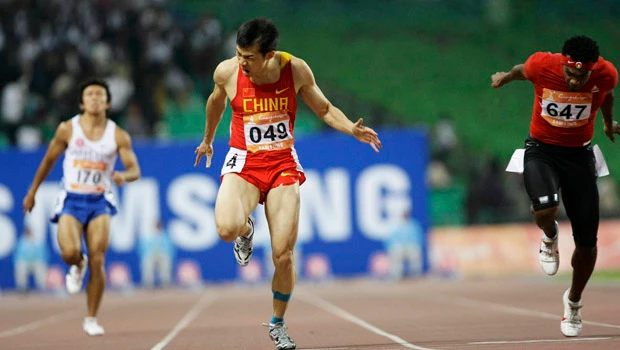 Lao Yi is fastest man in Asia