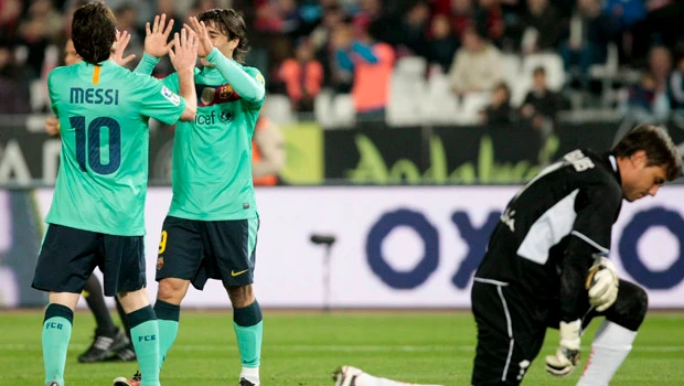 Barca looks to Messi with qualification in sight