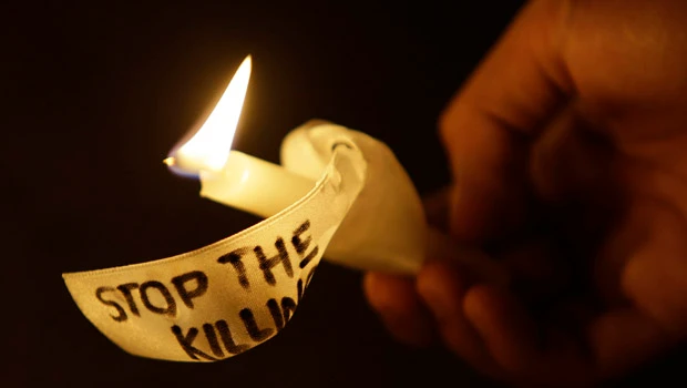 Philippine woman insists father died in massacre