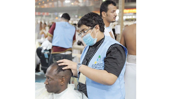 Young Saudis proud to be in Mina as barbers