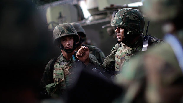 Rio police claim victory after invading gang haven