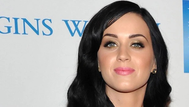 Katy Perry leads singles chart for third week