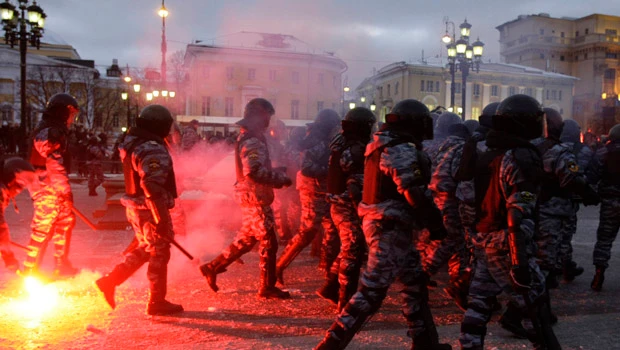 Moscow police, mourners clash; 3 reported injured