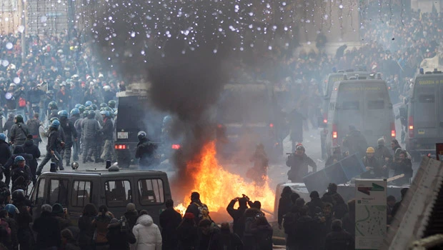 Protests erupt as Italian PM Berlusconi wins vote