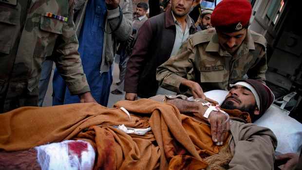 Female bomber kills 43 at food center in Pakistan