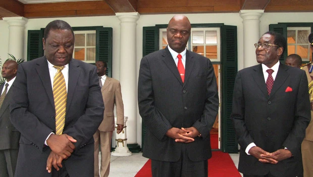 Mugabe, Tsvangirai say Zimbabwe unity govt working