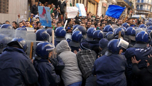 Algerian police break up march