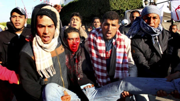 Tunisia seeks Ben Ali's arrest
