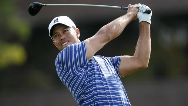 Woods starts year with 69