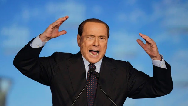 Berlusconi calls TV show a 'brothel'