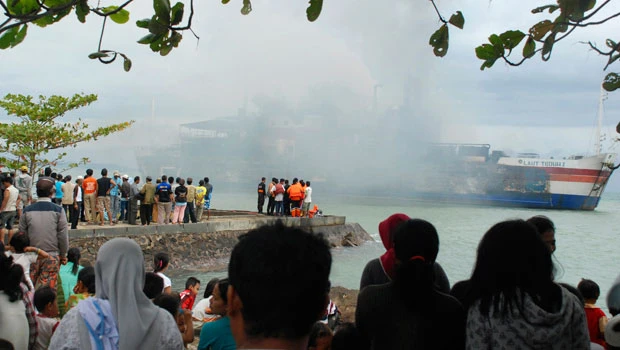Indonesian ferry fire, train collision kill 16