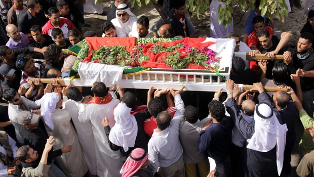 Thousands join funerals after Bahrain killings
