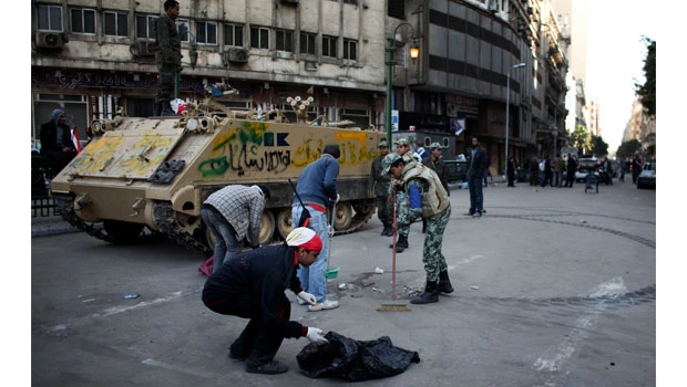 Egyptians clean up, seek 'clear assurances'