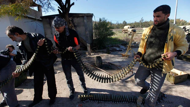 US moves forces closer to Libya as Qaddafi escalates crackdown