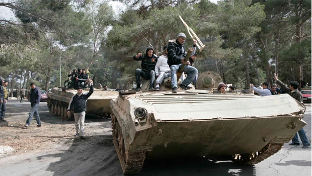 Qaddafi sets stage for last stand