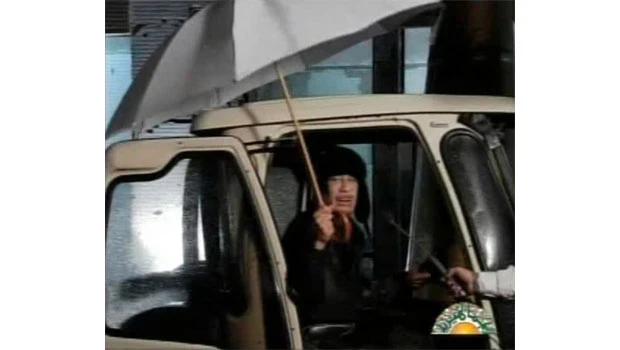Qaddafi goes on Libyan TV amid wave of protests